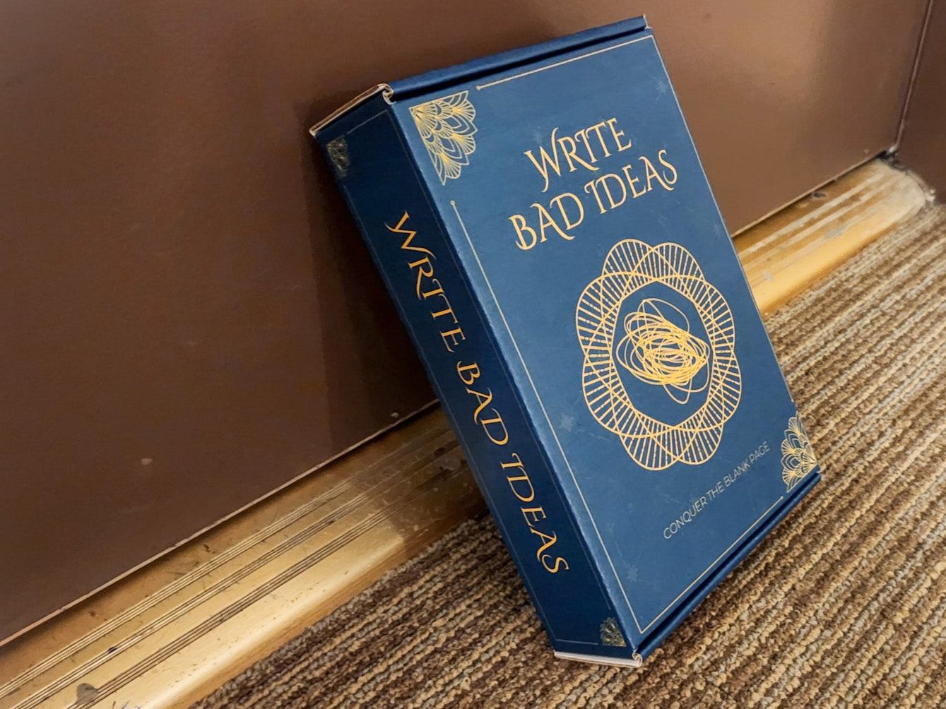 The Write Bad Ideas writer's subscription box in front of a door.