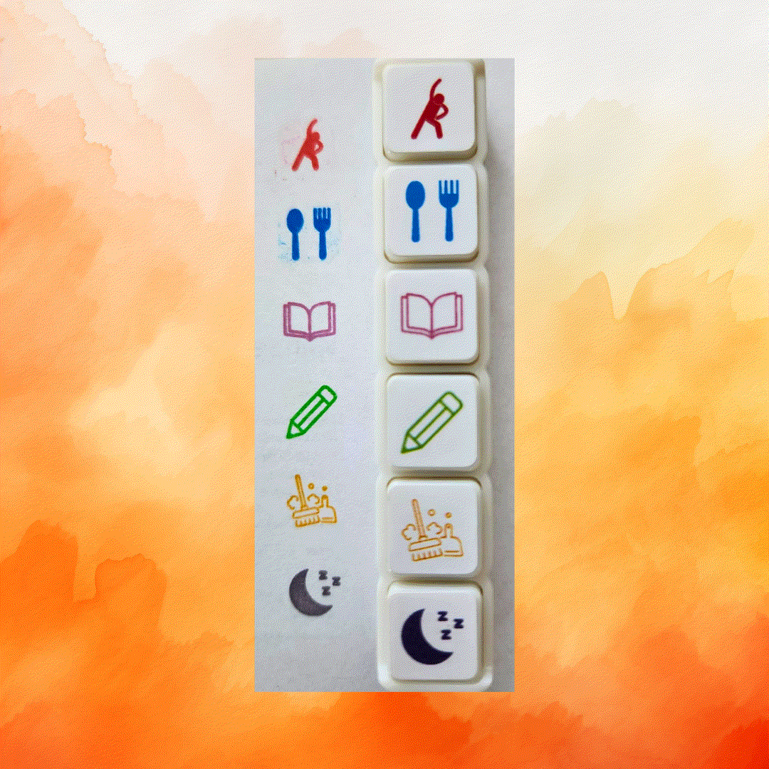 Writer's Planner push-button stamp set with 6 pre-inked icons including exercise, meal, book, pencil, cleaning, and sleep symbols