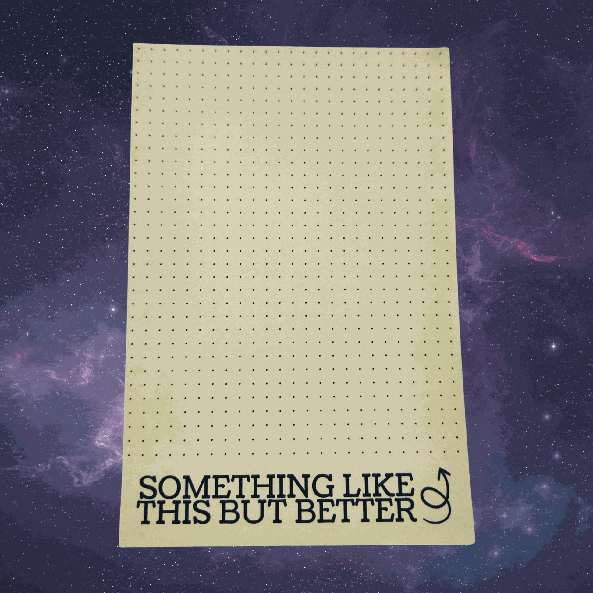 Sheet of grid paper with text 'Something Like This But Better' on a starry space background
